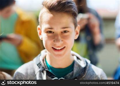 people and portrait concept - happy teenage boy face. happy teenage boy face