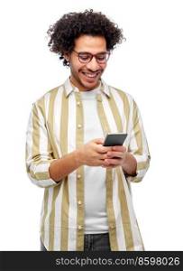 people and technology concept - happy smiling man in glasses with smartphone over white background. happy smiling man in glasses with smartphone