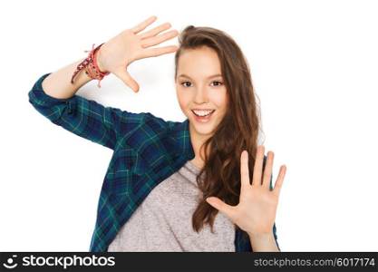 people and teens concept - happy smiling pretty teenage girl showing hands. happy smiling pretty teenage girl showing hands