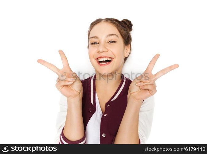 people and teens concept - happy smiling pretty teenage girl showing peace sign. happy smiling teenage girl showing peace sign
