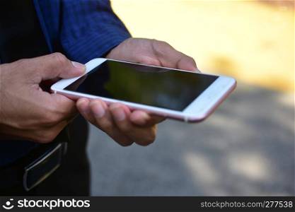 People are using mobile smart phone to shopping online,Hand holding internet smart phone