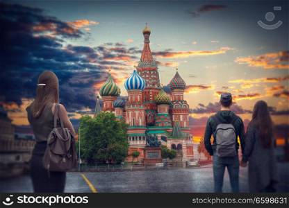 people are watching the sunset on Red Square, Moscow.