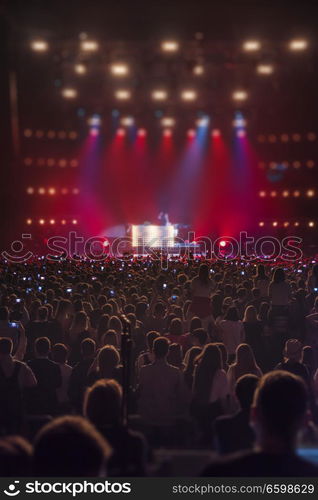 People at the concert are waiting for the show