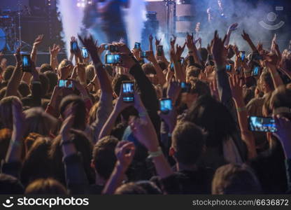 People at the concert are waiting for the show