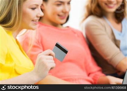 people, banking, shopping, technology and finance concept - close up of women or friends with credit card