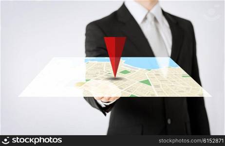 people, business, navigation, technology and location concept - close up of man hand showing gps navigator map projection