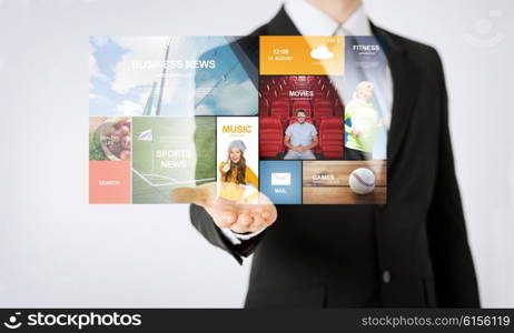 people, business, technology and mass media concept - close up of man hand showing web news projection