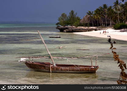 people cabin costline boat pirague in the blue lagoon relax of zanzibar africa