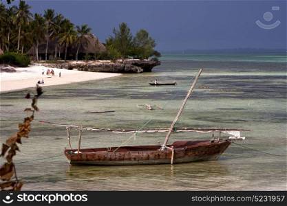people cabin costline boat pirague in the blue lagoon relax of zanzibar africa