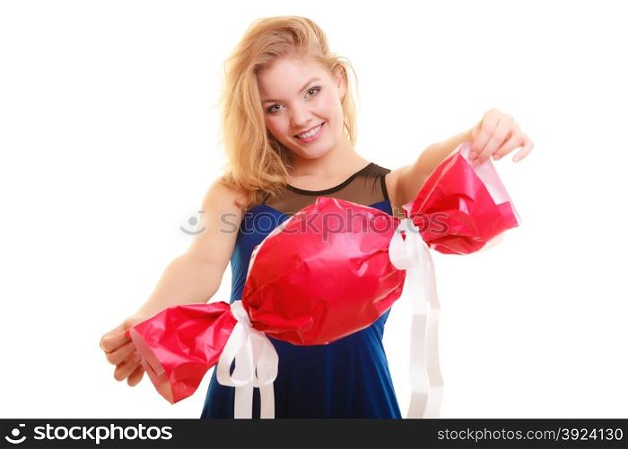 People celebrating holidays, love and happiness concept - smiling girl holding big red gift candy shaped isolated