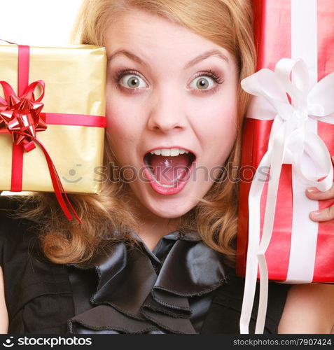 People celebrating holidays, love and happiness concept - surprised blonde girl with gift boxes isolated