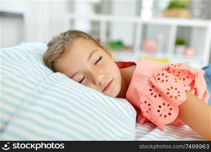 people, childhood and rest concept - little girl sleeping during day in her room at home. little girl sleeping in her room at home