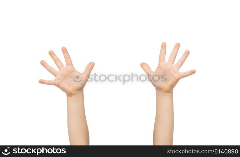 people, childhood, gesture and body parts concept - close up of little child hands raised up
