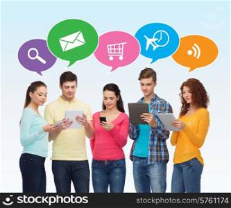 people, communication and technology concept - smiling friends with smartphones and tablet pc computers over blue background with doodles