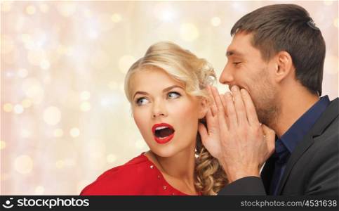 people, communication, gossiping, christmas and information concept - close up of man and woman spreading gossip over holidays lights and snow background