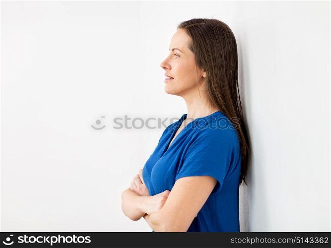 people concept - happy smiling middle aged woman. happy smiling middle aged woman