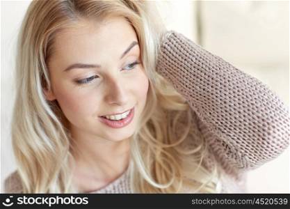 people concept - happy young woman or teenage girl at home. happy young woman or teenage girl at home
