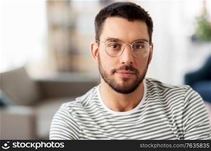 people concept - portrait of man in glasses at home. portrait of man in glasses at home