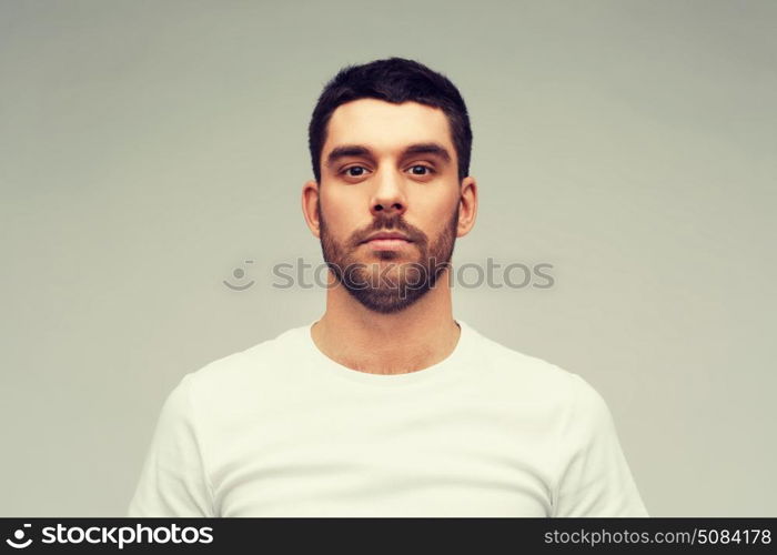 people concept - young man portrait over gray background. young man portrait over gray background. young man portrait over gray background