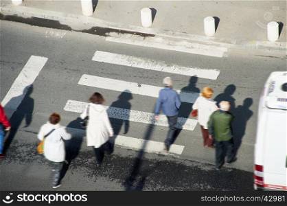 People crossing the street. Aerial view