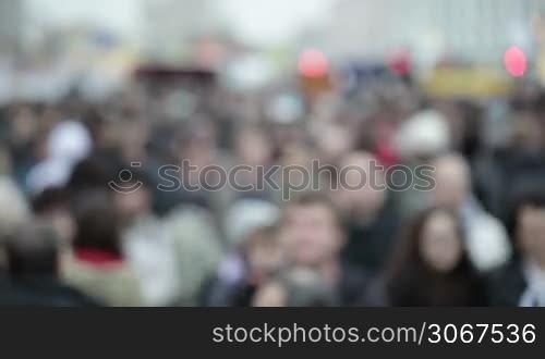 People crowd in blur rush hour