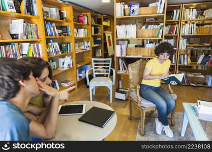 people discussing geeky woman library