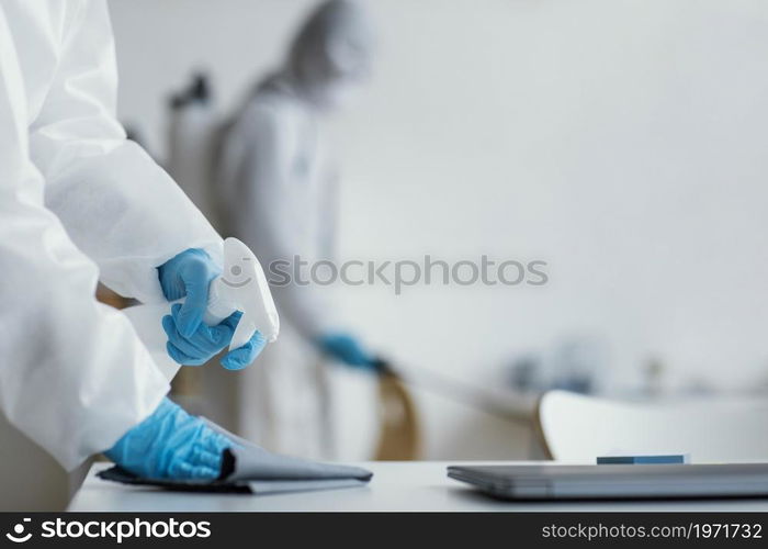 people disinfecting biohazard area. High resolution photo. people disinfecting biohazard area. High quality photo