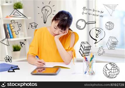 people, education, high school and learning concept - bored asian young woman student in glasses with tablet pc computer, book and notepad writing at home over doodles