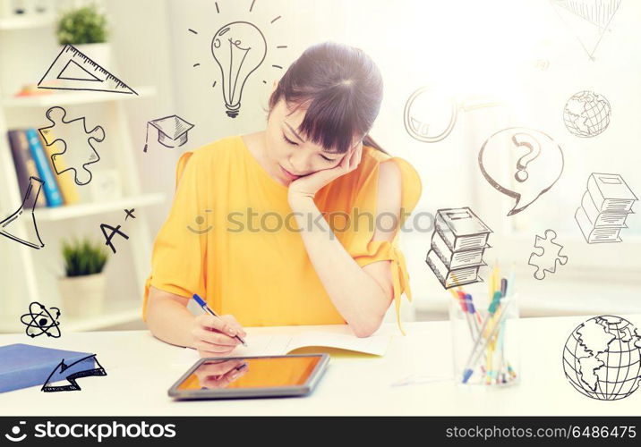 people, education, high school and learning concept - bored asian young woman student in glasses with tablet pc computer, book and notepad writing at home over doodles. bored asian woman student with tablet pc at home. bored asian woman student with tablet pc at home