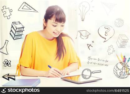 people, education, high school and learning concept - happy asian young woman student in glasses with tablet pc computer, book and notepad writing at home over doodles. asian woman student with tablet pc at home. asian woman student with tablet pc at home