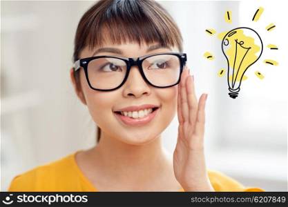 people, education, vision and portrait concept - happy asian young woman or teenage student girl in glasses over light bulb doodle