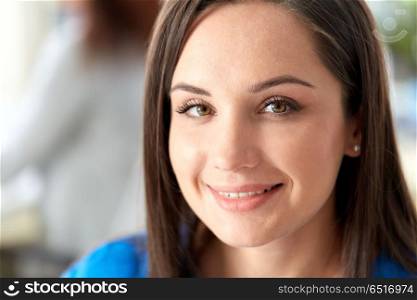 people, emotion and facial expression concept - portrait of happy smiling young woman. portrait of happy smiling young woman. portrait of happy smiling young woman