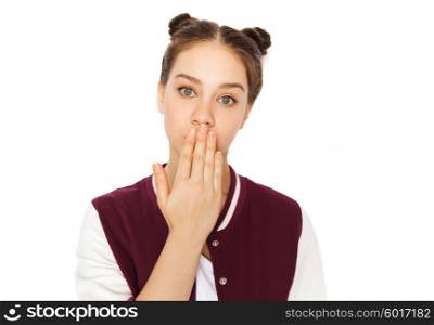 people, emotion, expression and teens concept - confused teenage girl covering her mouth by hand