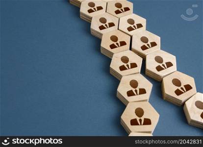People employees are unite in a single chain. Integration acquisition concept. Consolidation, cooperation, organization. Division into two groups. Staff restructuring. Merge of companys departments.