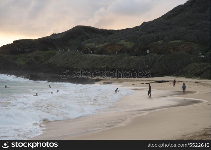 People enjoying the beach, Sandy Beach, Oahu, Hawaii, USA