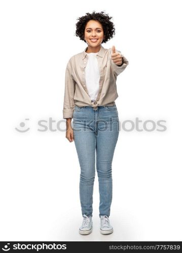people, ethnicity and portrait concept - happy smiling woman in shirt and jeans over white background. happy smiling woman in shirt and jeans