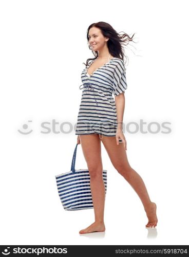 people, fashion, summer and beach concept - happy young woman in bikini swimsuit and sun hat