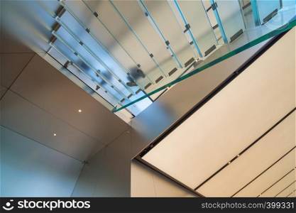 People feet walking on a transparent staircase, business concept.