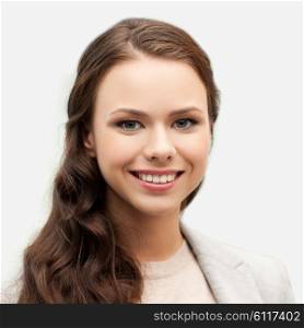 people, female, business and portrait concept - happy smiling young woman face