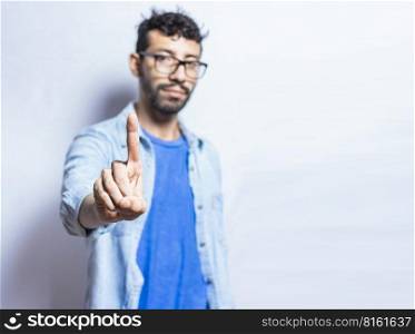 People finger counting the number one on an isolated background. Person hand counting number one, Hand of handsome guy showing number one