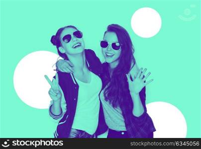 people, friendship and fashion concept - happy laughing teenage girls in sunglasses having fun and showing peace hand sign, trendy duotone effect. smiling teenage girls in sunglasses having fun