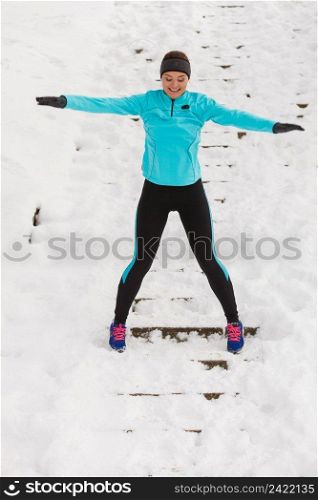 People fun spare time concept. Girl enjoying winter time. Young woman wearing sporty and warm outfit.. Girl enjoying winter time.