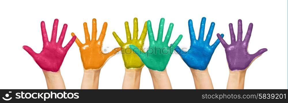 people, gay pride, creativity and art concept - palms of human hands painted in rainbow colors
