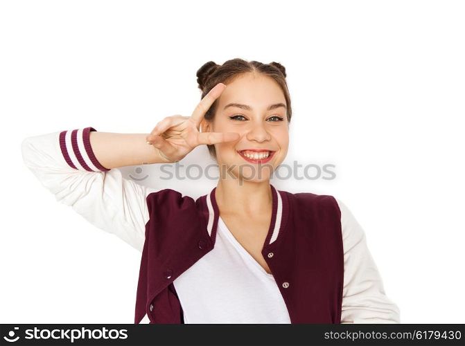 people, gesture and teens concept - happy smiling pretty teenage girl showing peace sign