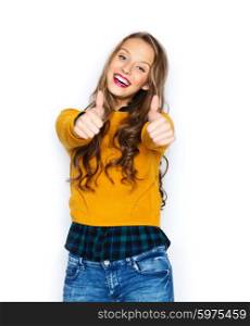 people, gesture, style and fashion concept - happy young woman or teen girl in casual clothes showing thumbs up