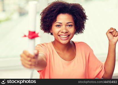 people, graduation and education concept - happy african american woman with diploma at home