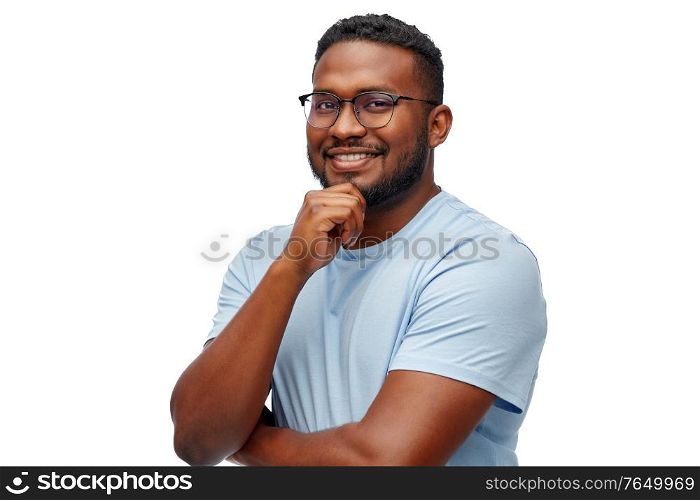 people, grooming and beauty concept - portrait of happy smiling young african american man in glasses over white background. smiling african american man in glasses