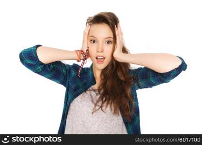 people, hair care, style and teens concept - happy pretty teenage girl holding to head. happy pretty teenage girl holding to head