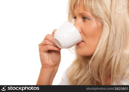 People, happiness, drink and food concept. Mature woman drinking tea or coffee. Cup of Hot Beverage. white background