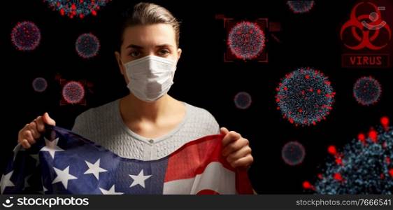 people, health and pandemic concept - sick young woman in protective medical face mask for protection from virus disease holding flag of america over black background. sick woman in face mask holding flag of america